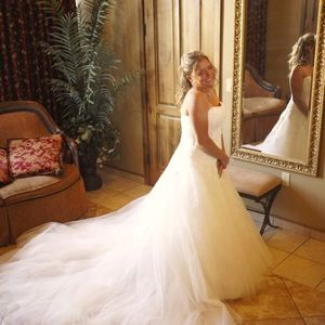 Wedding dress ivory 6 layers with diamonds size 10, with veil made to sparkle